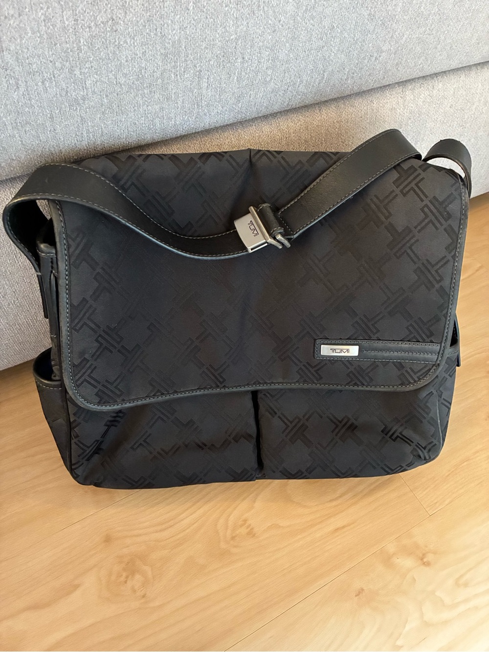 TUMI Black Monogram Messenger Bag in really good condition